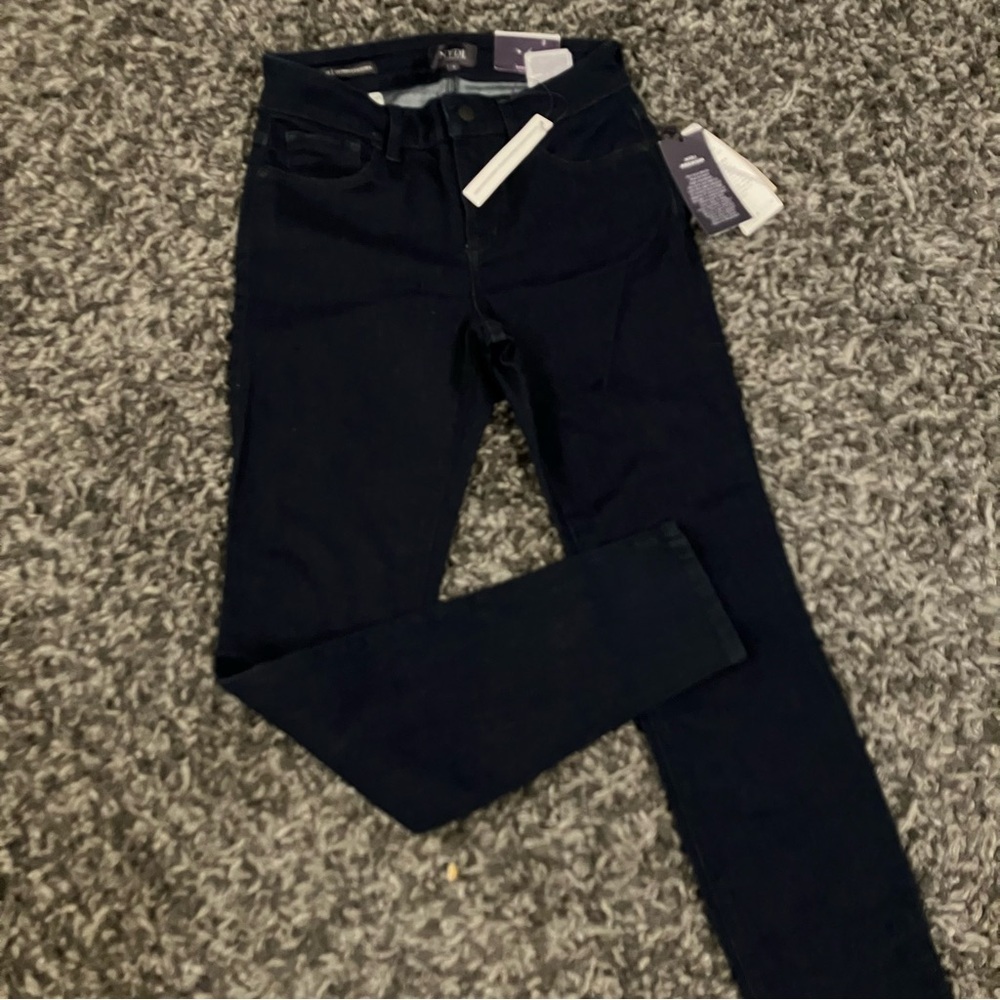 NYDJ dark blue stretchy denim jeans.  Skinny.  New